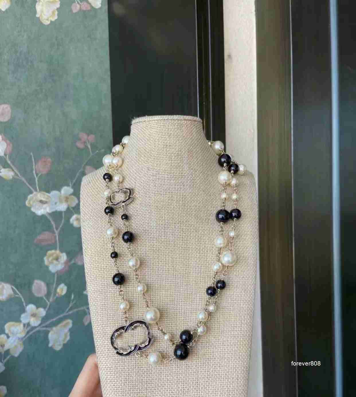 Colliers à pendentif Colliers de perles Classiques de la mode Rétro Long Colliers de perles Chaîne pour femmes Hommes Fête Amoureux de mariage Ca