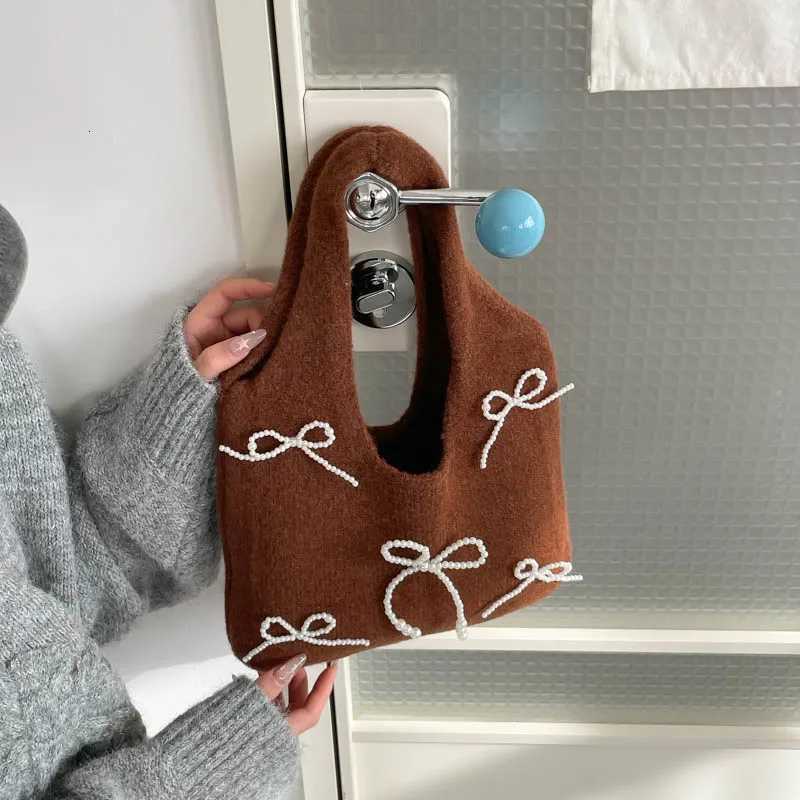 Unique Niche Bow-Knot Woolen Bag for Women 2025 New Exquisite and Trendy Hand-Held Bucket Bag for Going Out 35013BJXJ251206