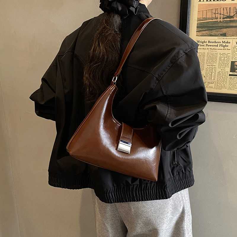 7071HS 2025 automne et hiver nouveau sac sous les bras rétro américain sac fourre-tout haut de gamme léger sac de banlieue de luxe sac à bandouli