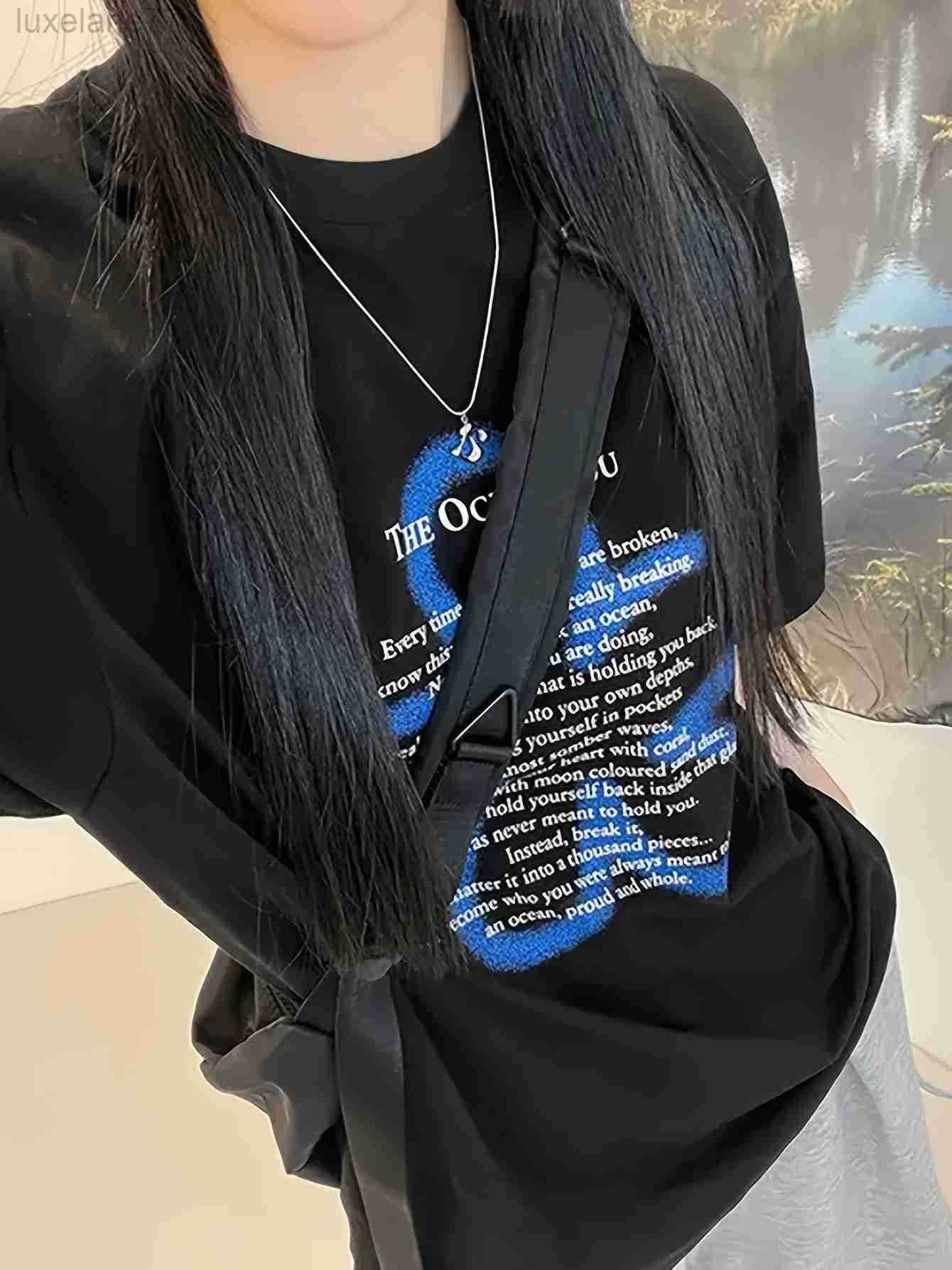 Y2K T-Shirt graphique surdimensionné pour femmes-T-Shirt noir imprimé de lettres, Streetwear doux et épicé, haut d'été décontracté, coupe ample C
