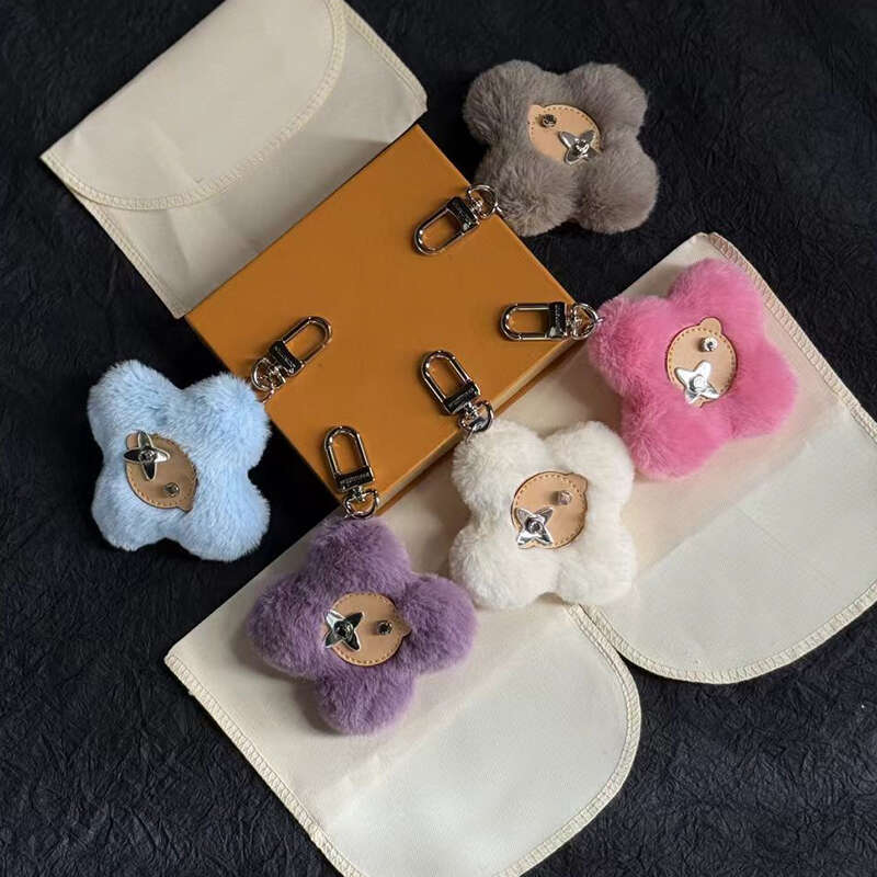 Pendentif de sacs de créateurs, accessoire de luxe, porte-clés en peluche tournesol, clé de voiture