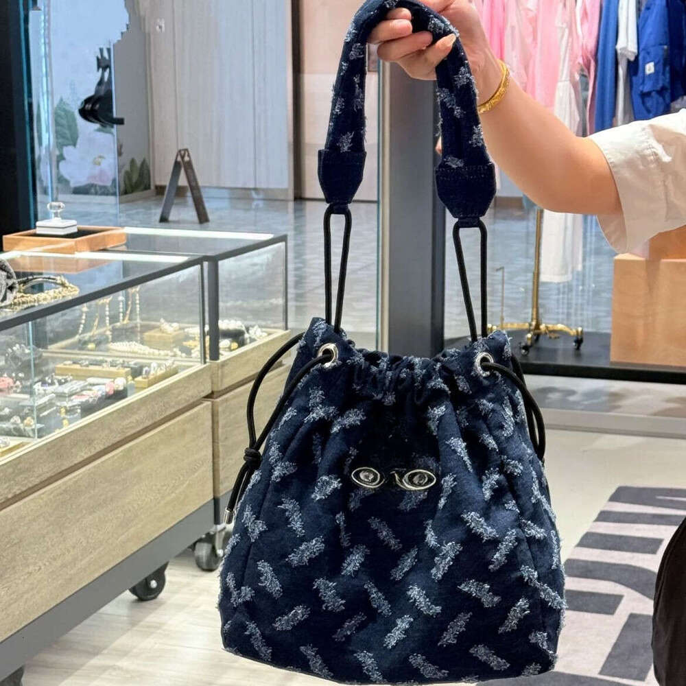 viviannen bag saturn bag with logo Empress Dowager Saturn Print Denim Bucket for Women 2025 Autumn New Drawstring Handbag Shoulder Underarm Bag