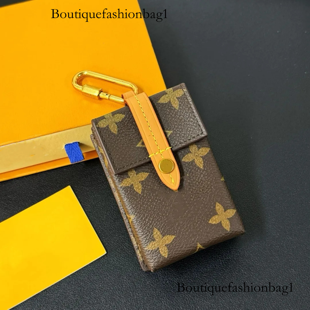 25SS Mens Womens Luxury Designer Cigarette Case Pendant Hanging Decoration Can Put Wireless Earphones Car Keys Cigarettes Pocket Money Tissue And Ot