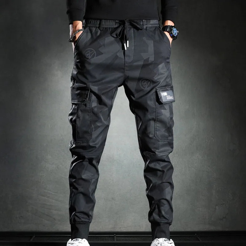 2025 Men spring and autumn slim fit camouflage work pants elastic wearresistant fashionable casual leggings 251129