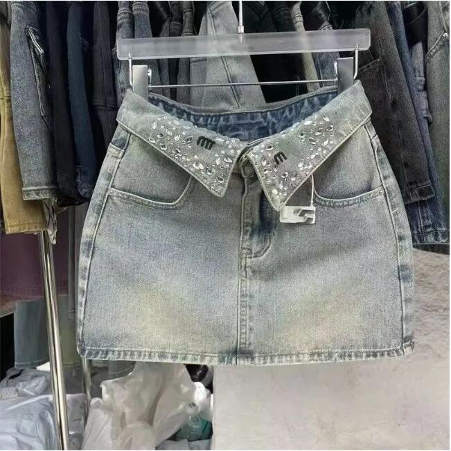 2026 Spring and Summer New Light Blue V-shaped Flip Neck Denim Skirt High Waist Small Spicy Girl Hot Diamond Sweet Spicy Short Skirt Sasa