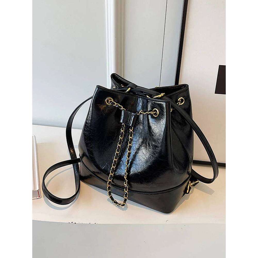 Borse firmate Zaino da donna vintage Autunno Inverno Design chic Borse a secchiello da donna in pelle PU testurizzata Borsa a tracolla versatile pop
