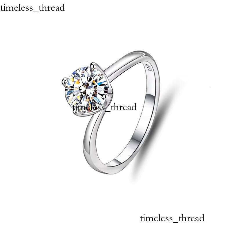 Natuna Beautiful 925 Sterling Silver 1CT Round Cut Six-Prong Silicon Stone VVS Moissanite Engagement Wedding Ring