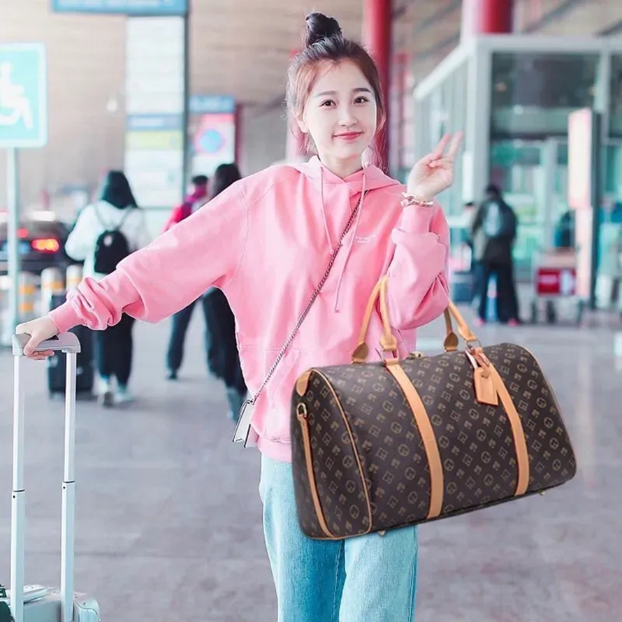 Designer bag 55CM Leather designerS men women Duffel Bags Suitcases luggage Sport Outdoor Packs shoulder Travel bags messenger bag Totes bags Unisex