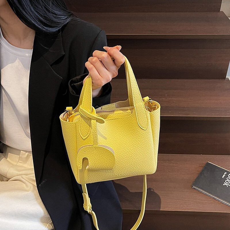 Fashion solid color women's high-end texture single shoulder handbag travel crossbody bag Korean version bucket shaped handbag designer bag