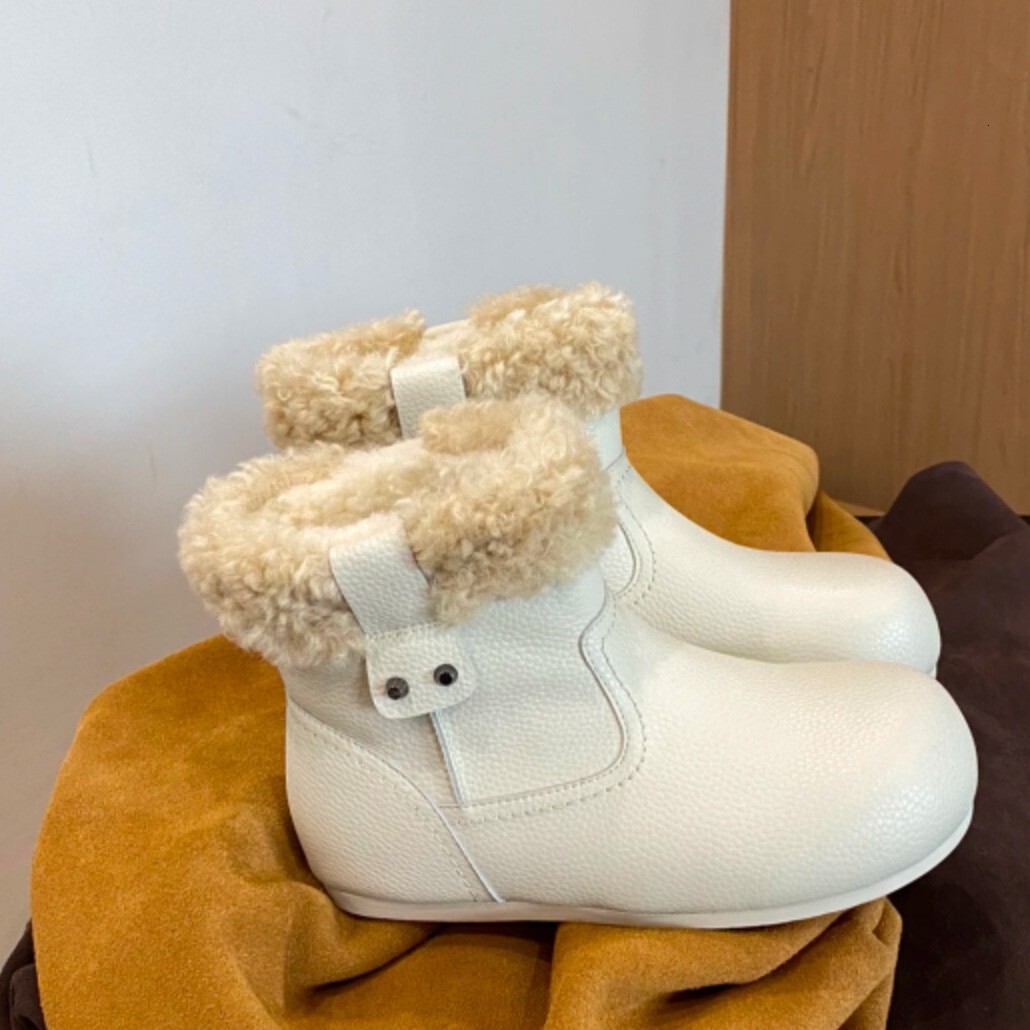Fashionable and high-quality cowhide short cotton boots, winter leather surface height increasing snow boots women's slip on fur boots designer
