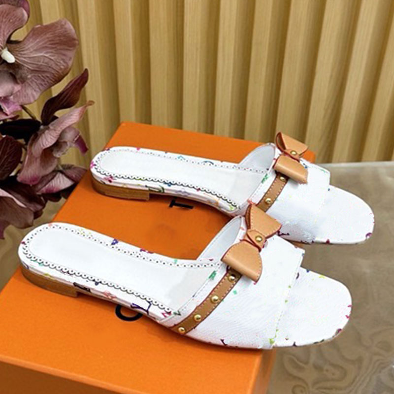 Sandali con fiocco di design Scarpe basse colorate giocose da donna Scarpe casual in tela monogramma da donna Pelle bovina liscia Taglie 35 41