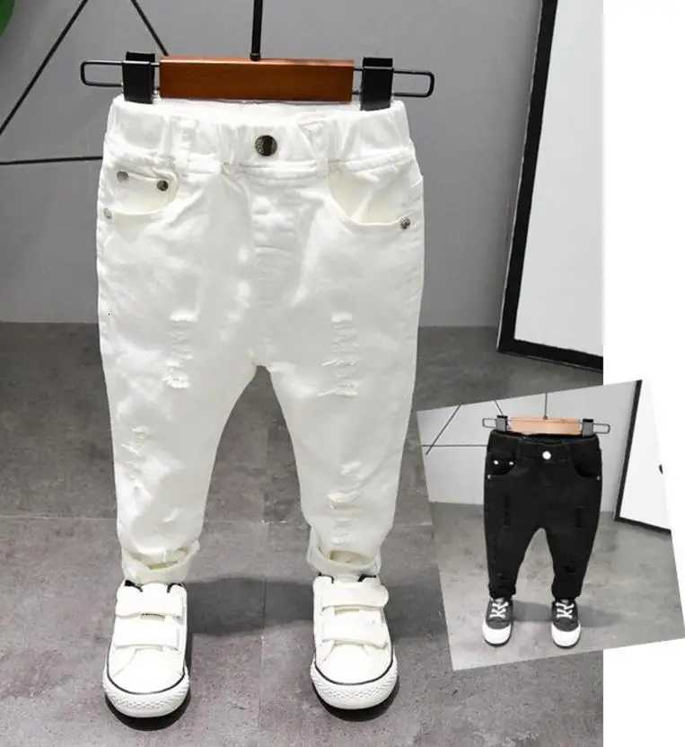 Nouveaux pantalons pour enfants Vêtements de chorale Pur blanc / noir Étudiants Concours Jeans droits Enfants Garçons Confortable Pantalon de dan
