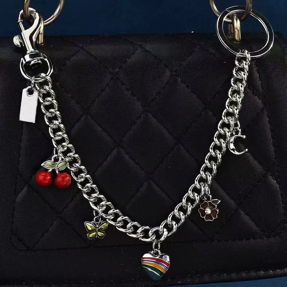 Charme de sac de mode Porte-clés de luxe pour femmes breloques de sac Co argent Porte-clés chariot Classique Pendentif chaîne Mode Porte-clés qua