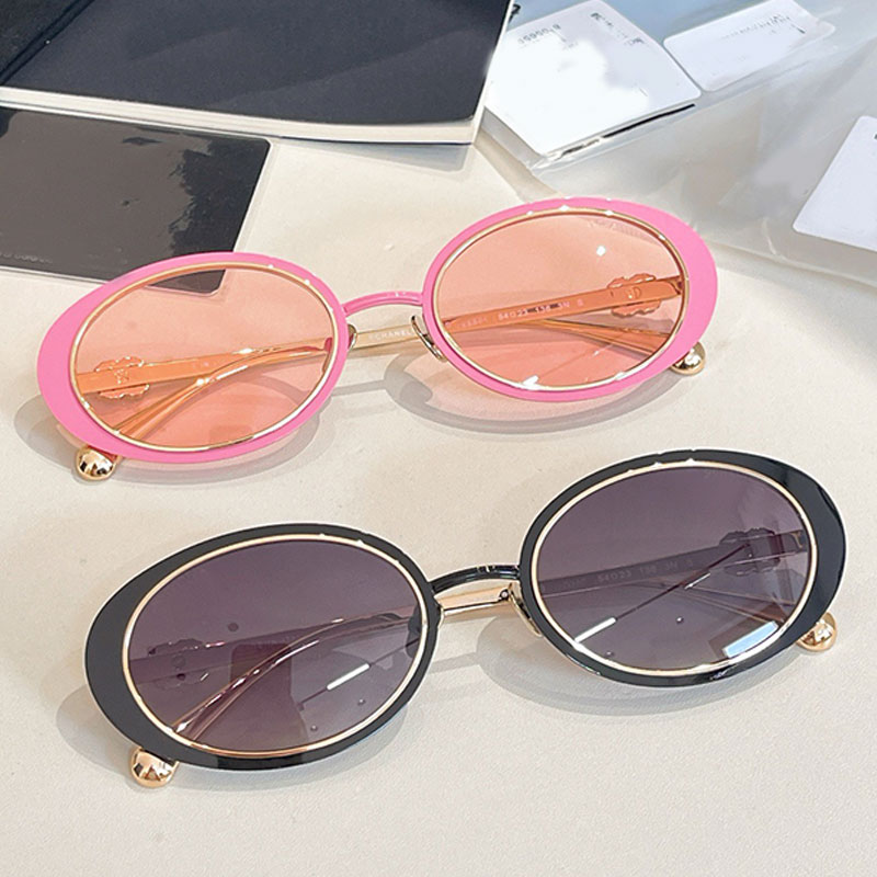 Pink womens oval sunglasses 25SS new mens outdoor party glasses 9578B popular woman acetate framed metal leg glasses Designer UV400 protection Man s