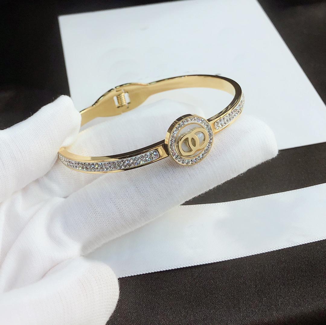 Luxury Gold-Tone Bangle Bracelet With Crystal-Studded Signature Motif Elegant Evening Jewelry And Special Occasion Gift For Her Glamorous Yet Aff-image-762404433