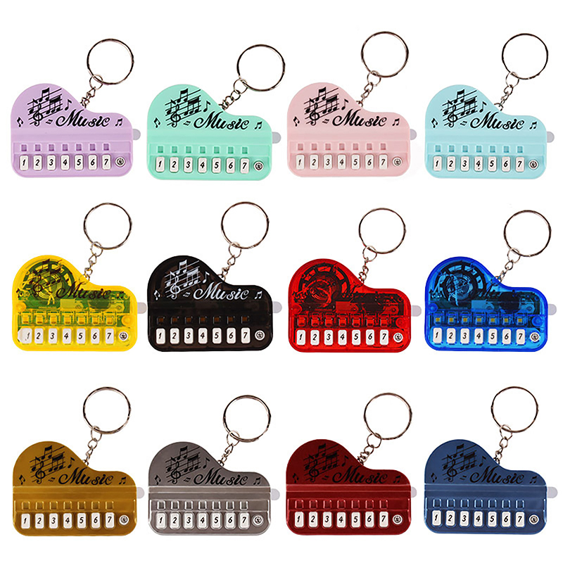 1PC Mini Electronic Keyboard Keychain Portable Musical Instrument Toy Piano Keychain Mini Real Working Finger Piano Keychain