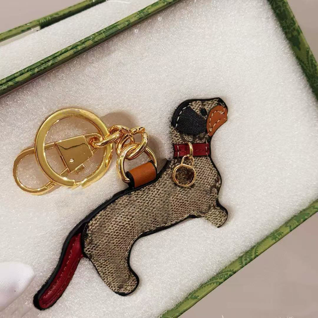 Porte-clés en cuir pour chien Porte-clés designer pour hommes femmes avec boîte cadeau pendentif sac idée cadeau parfait Noël
