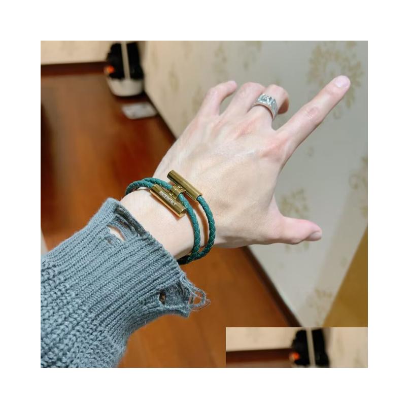 Charm Bracelets Charm Bracelets Fashion Unisex Orange Leather Rope Wristband Genuine Braided Hand Bracelet Designer Jewelry For Elegant Men Women Dr