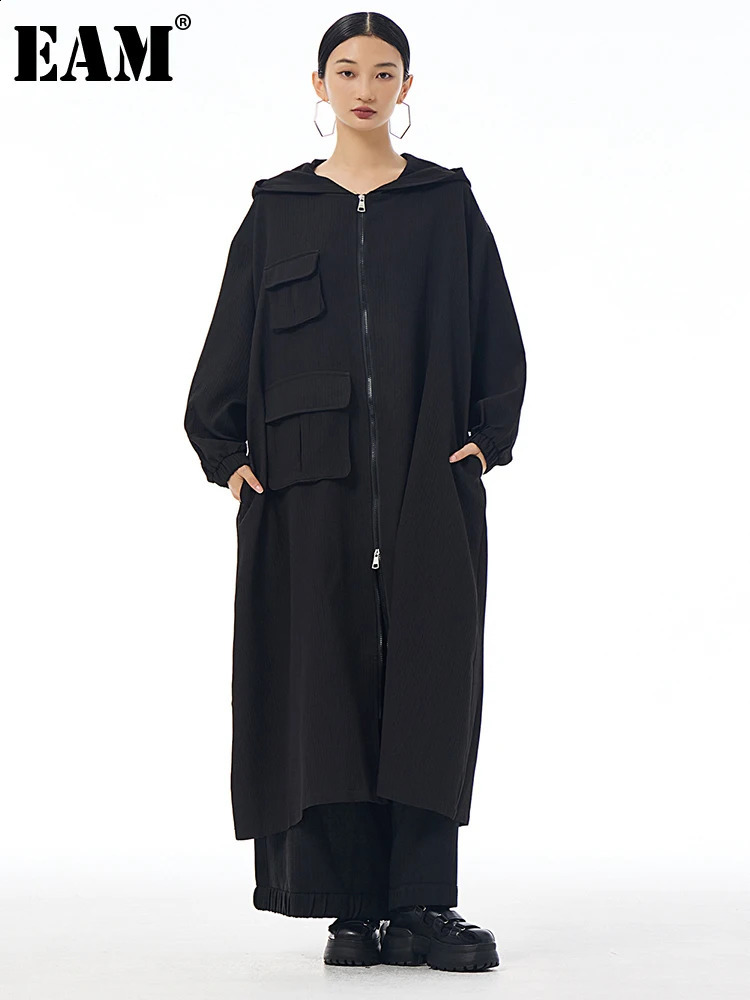 EAM Women Black Pocket Spliced Big Size Trench Hooded Long Sleeve Windbreaker Fashion Spring Autumn 2025 1DJ2186 250730