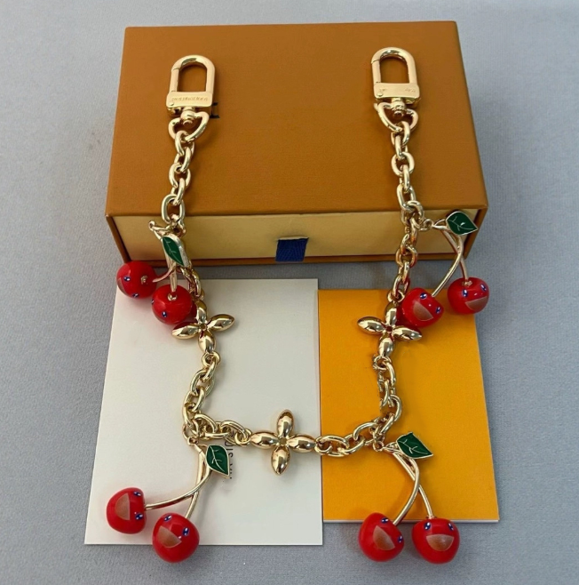 Designer keychains bags chain pendants cherry flower pendants Charm keychains car keychains Metal Chain Colored Keychain birthday present with box
