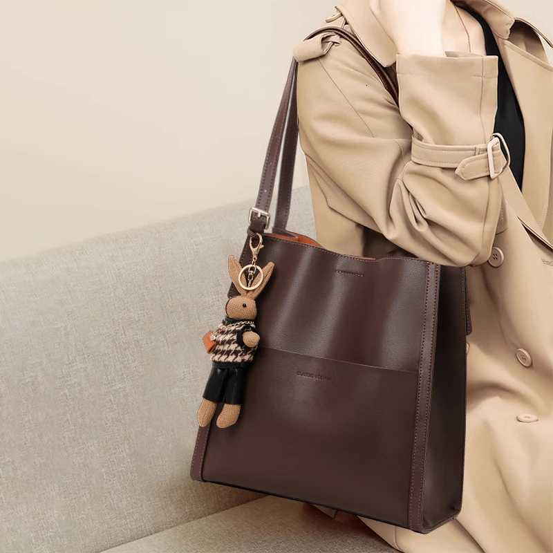 2024 New Vertical Handbag Large Capacity High end Commuting One Shoulder Genuine Leather Womens Bag X251104