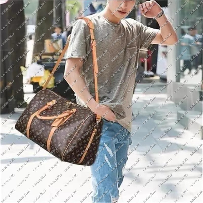 Top 2023 Quality New Men Duffle Bag Women Travel Bags Hand Luggage Travel Bags Men Pu Leather Handbags Large CrossBody Bags Totes 55cm speed 30cm
