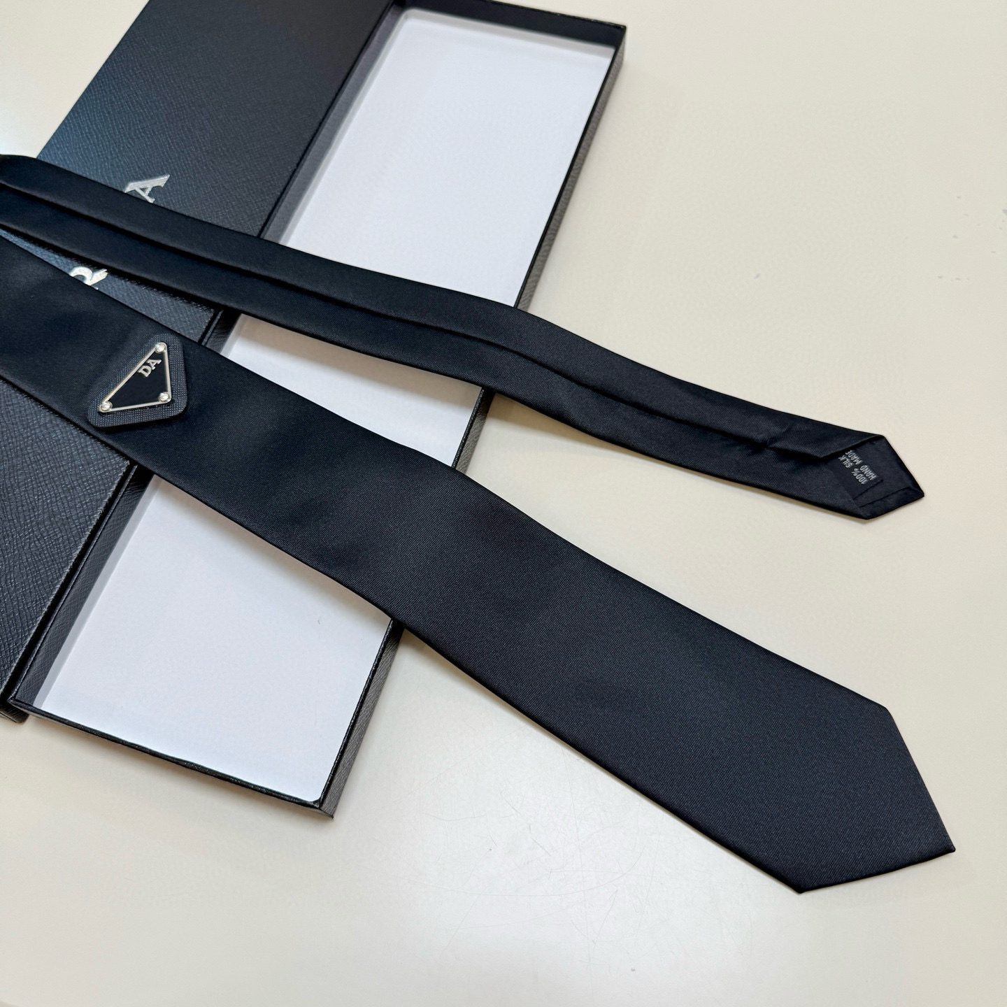Elegant High-Quality Tie by Top Designers Classic Black with Blue Accents Suitable for All Males' Attire Needs