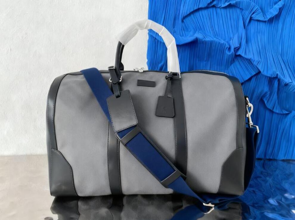 Designers Duffel Bags 50CM luxury large capacity travel sale women men Genuine Leather shoulder Fashion duffle bag carry rivets-image-1084435889