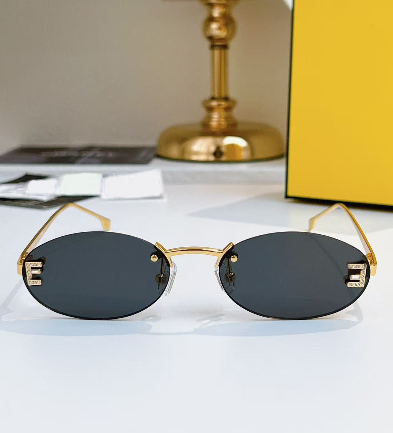 10A High quality designer sunglasses for women Frameless Oval FE4075US Classics Metal frame Sun glasses Circle shape UV Protection During Summer
