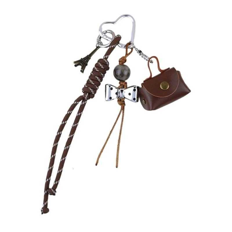 Le pendentif de sac de support unique décore le charme de sacs ajoute une touche d'élégance à votre sac à main pour les fêtes ou les sorties déco