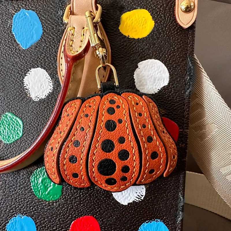 Sac Original en peau de mouton à pois, citrouille jaune, accessoires faits à la main en cuir véritable, clé de voiture, sac de luxe, pendentif xj