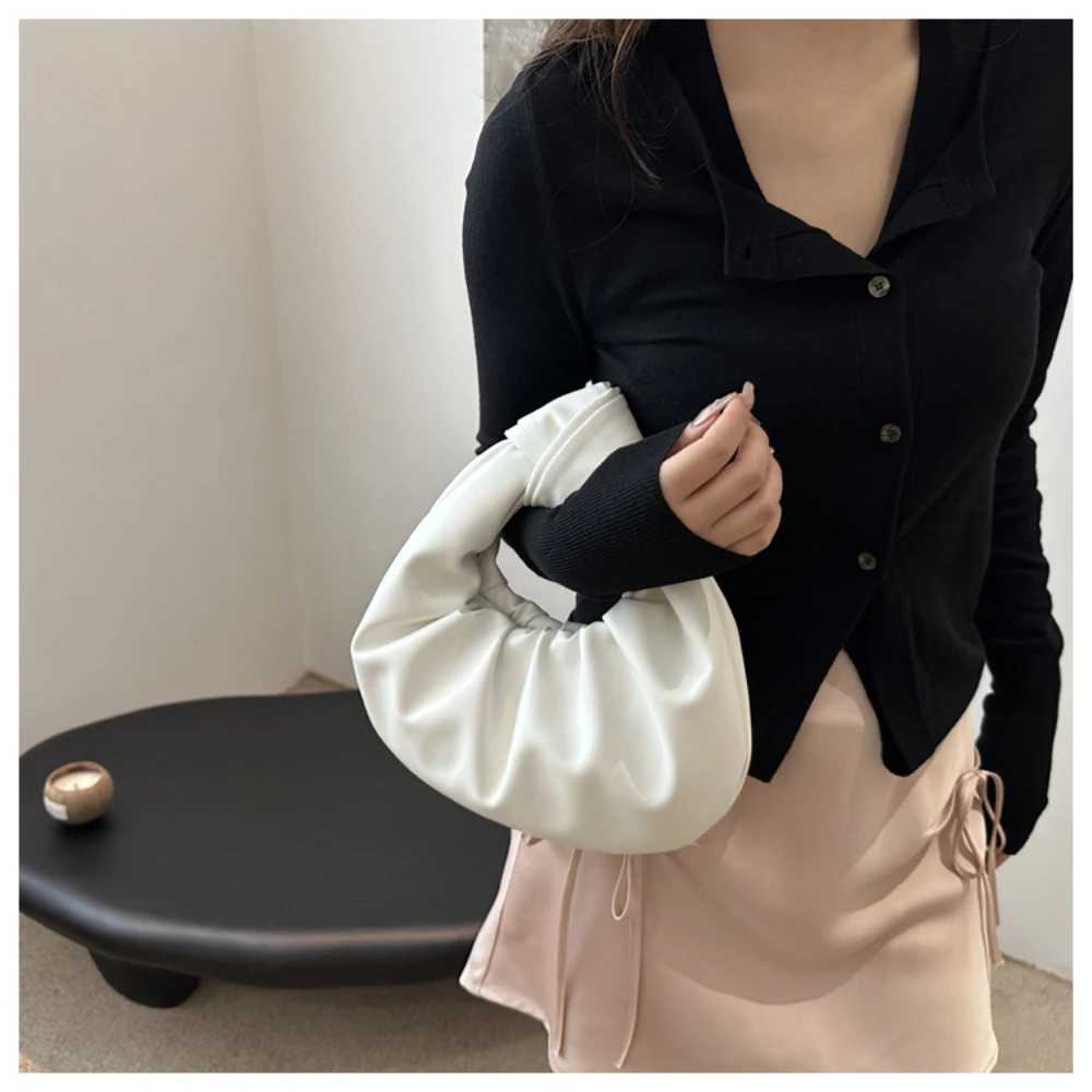 Womens pleated clutch bag solid color PU leather knot wrist bag top handbag fashionable and simple womens pleated phone bag walletXJ250417