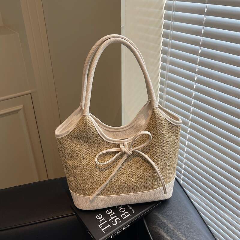 New spliced grass woven women's simple and fashionable large capacity shoulder lace up small fragrant style tote bag with temperament