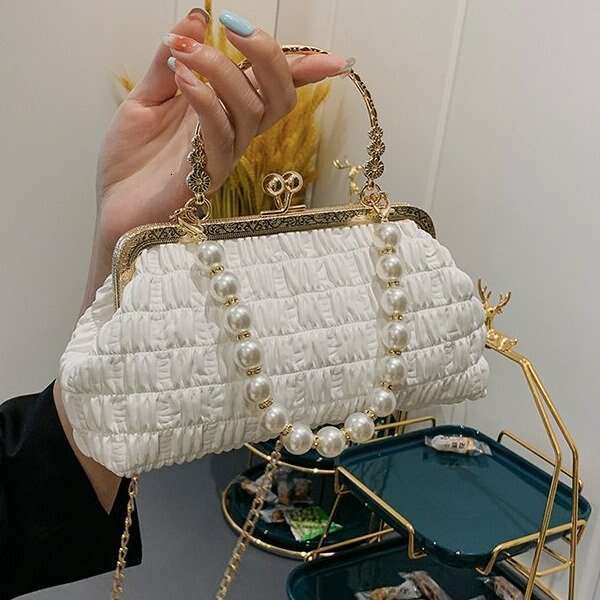 2025 new women's handbag temperament simple pearl chain stylish sequin texture single shoulder crossbody armpit bag