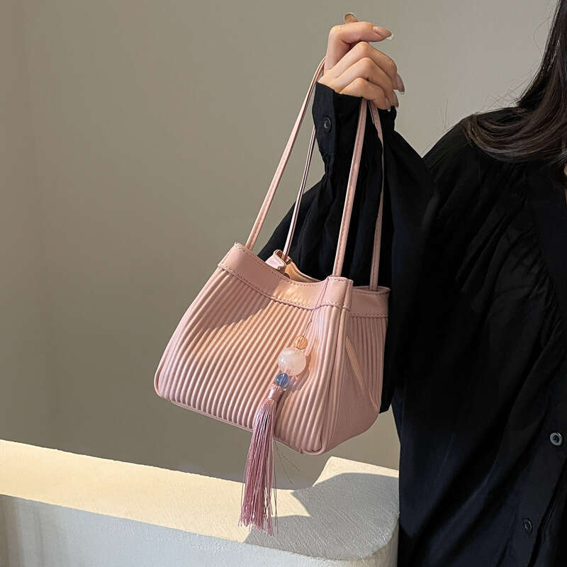 This year's new high end texture women's fashion niche design striped single shoulder crossbody tote small square bag