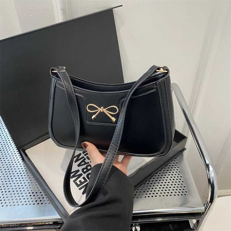 Fashionable womens PU leather underwear bag with zipper and gold bow decoration elegant and casual ten letter wallet suitable for daily useXJ2504