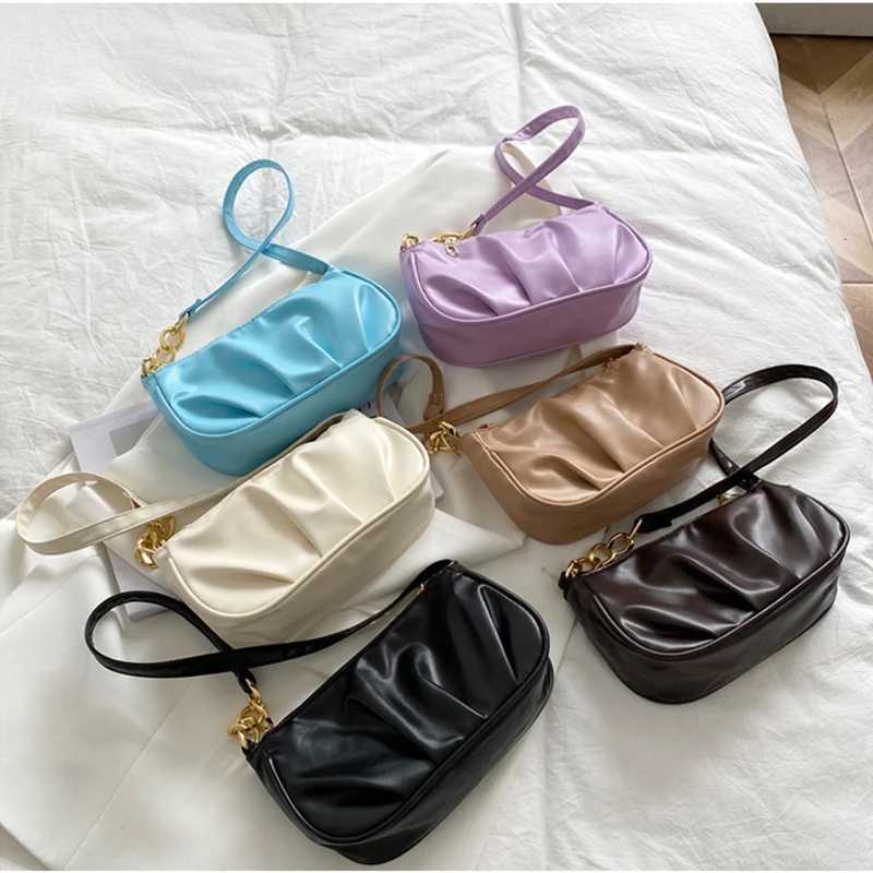 Classic design handbag womens shoulder bag solid color luxury designer armpit bag casual womens crescent retro garbage bagXJ250419
