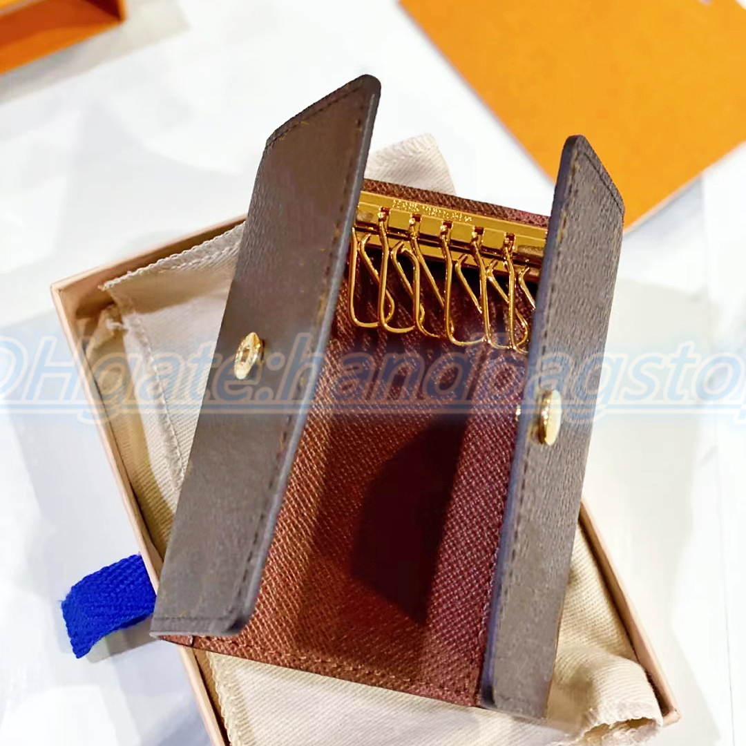 Portefeuilles clés de mode de haute qualité en cuir de haute qualité Porte-monnaie de luxe Porte-monnaie intérieure pour hommes cale
