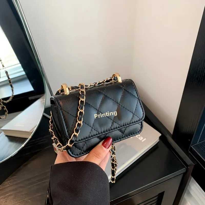 Fashion mini lock womens cross shaped bag Korean style spring and summer new item fully matched small square bagXJ250420