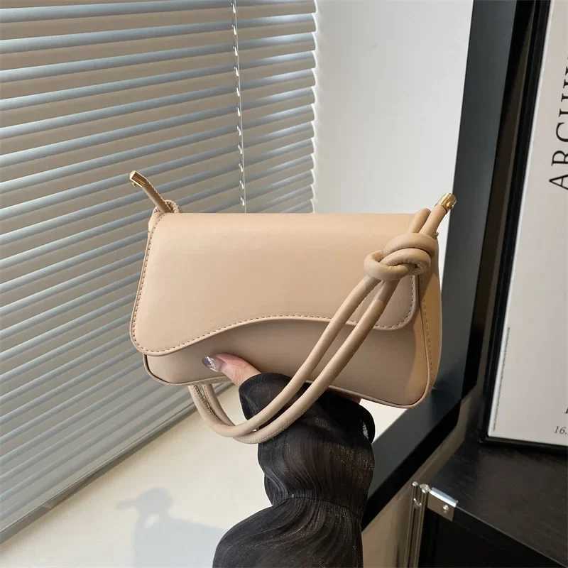 Spring 2025 New Commuter Fashion Leisure Solid Color One Shoulder Oval Large Span Hand Bottom Womens BagXJ250420