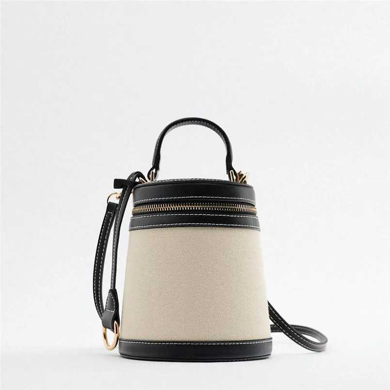 Casual canvas bucket shaped womens handbag designer brand shoulder cross bag 2023 womens small clutch flap W250421