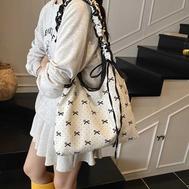 Japanese Style Niche Bow Pleated Canvas Tote Bag for Women 2025 New Single Shoulder Armpit Bag Commuter Large Capacity BagXJ251122