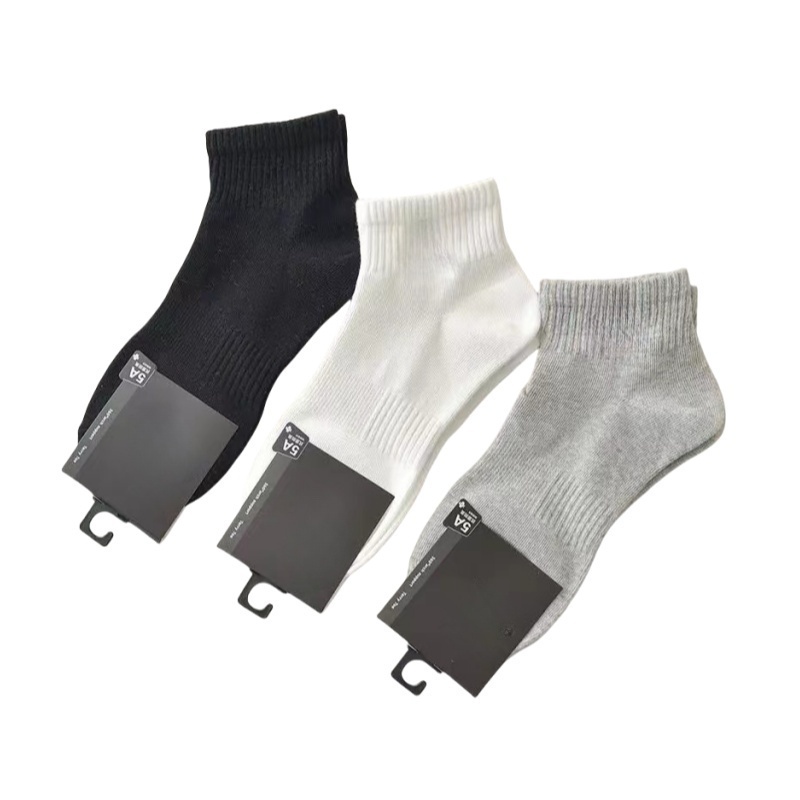 Mens socks unisex European metal triangle tag men's designer socks cotton sports casual girls sexy and fashionable short tube socks