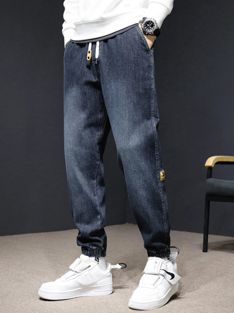 Jeans jeans in stile autunno insaccati insaccati pantaloni harem da jogging casual basket denim sports pantalone da uomo 250409z