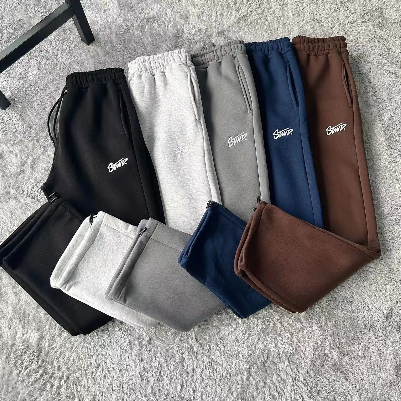 Pantalons de créateurs pour hommes Nouvelle série d'impression SWD populaire Pantalons à jambes larges décontractés minimalistes pour les couples