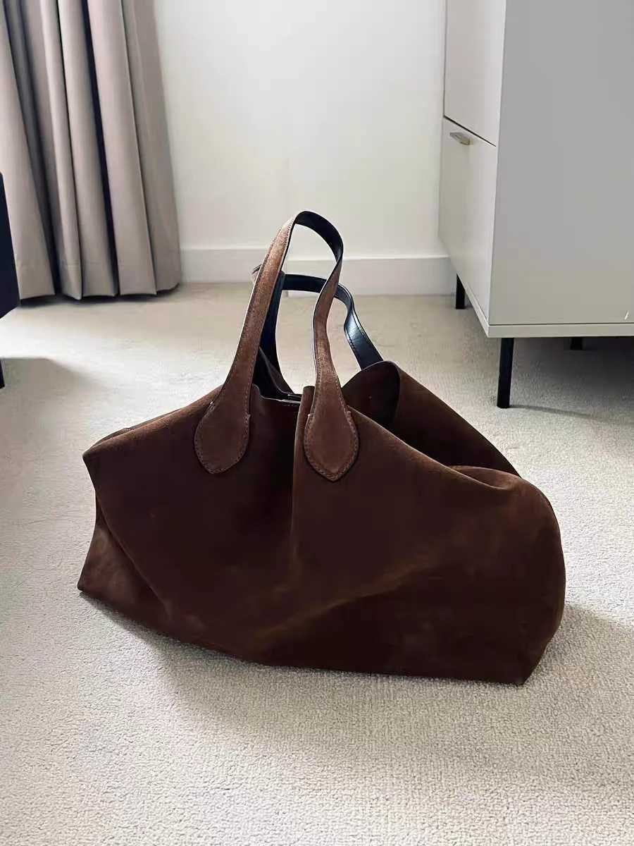 Suede Autumn and Winter Shoulder 2024 Niche Design Wing Matte Cowhide Large Capacity Womens Handheld Tote Bag Z250425