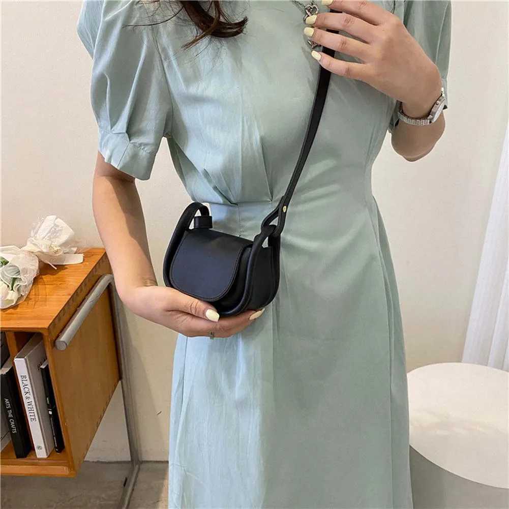 Mini designer cross body bag PU leather womens fashion design solid small lipstick bag trend exquisite messenger handbag W250425