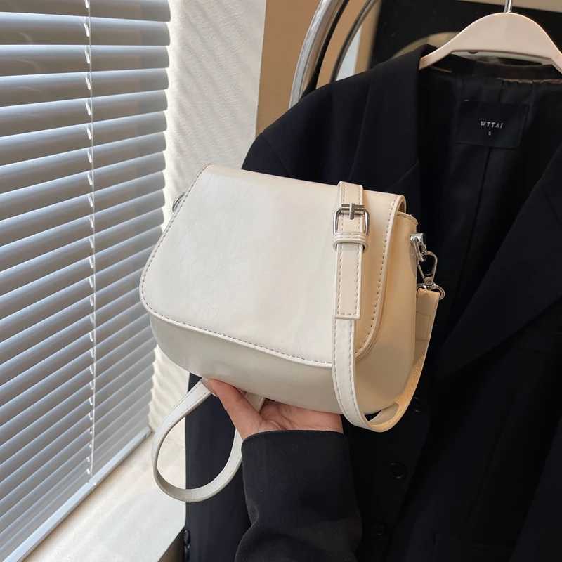 Solid color simple PU material shoulder bag small exquisite light casual W250425