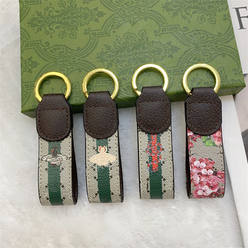 Porte-clés classique exquis de haute qualité, nouvelle mode, pour sac d'écouteurs, pour hommes et femmes