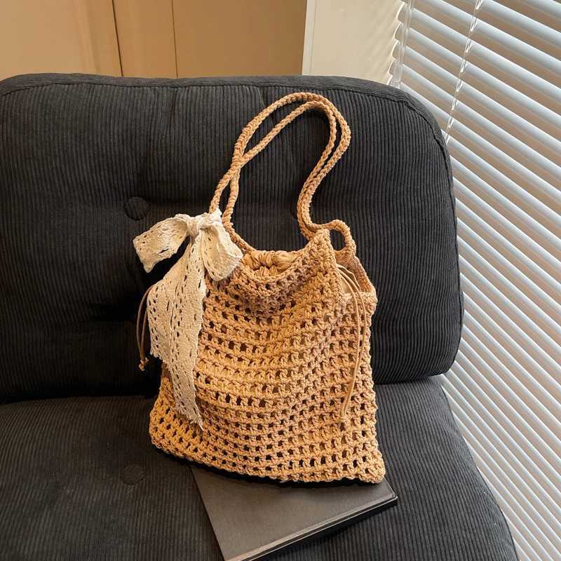 Sac à épaule des femmes creux d'été Nouveau sac de plage décontracté.